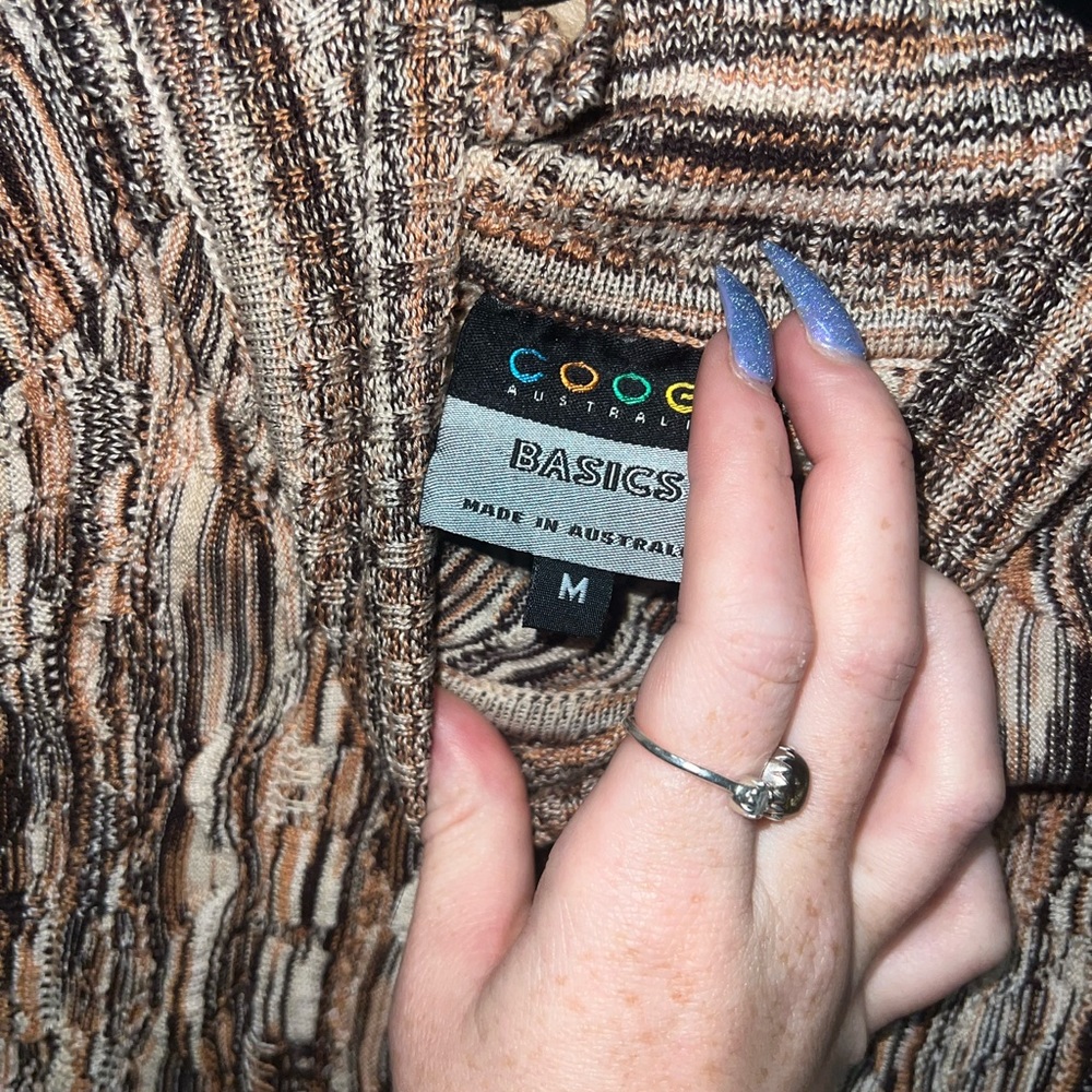 never before worn new cream, brown, black authentic coogi sweater